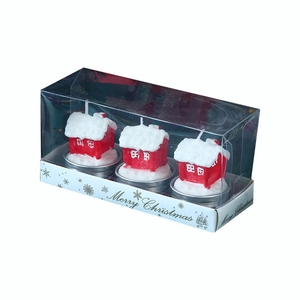 Christmas candle gift set with three red snow-topped house candles in a clear display box