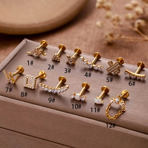 Set of 12 G23 titanium labret studs and cartilage earrings with gold zircons