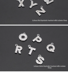 Detail of rhinestone initial pendants X-Z with silver alloy base and round hanging loops