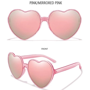 Detailed views of pink heart-shaped sunglasses with matching pink mirrored lenses