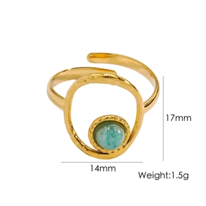 Detail view of gold geometric ring with turquoise stone inlay, dimensions 17mm by 14mm