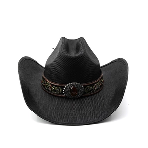 Detail of black straw cowboy hat with embroidered brown band and vintage gemstone buckle