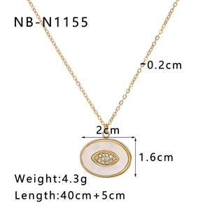 Detailed specs of sun and moon pendant necklace with white shell inlay and gold plating