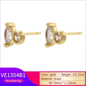 Luxury gold brass stud earrings featuring marquise and round cut clear zircon crystals