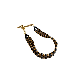 Elegant gold and black multi-strand beaded mesh necklace with adjustable lobster clasp