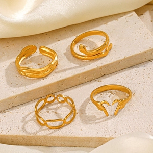 Set of four 18K gold plated stainless steel open rings with unique geometric heart designs