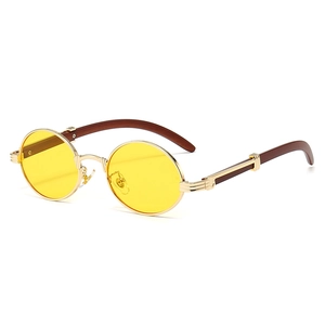 Retro oval sunglasses with yellow lenses, gold metal frames, and dark wood grain temples