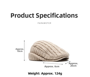 Detail showing beige cable knit ivy cap dimensions 10cm height and 124g weight