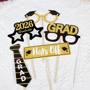 25pcs black and gold 2026 graduation photo booth props with wooden sticks on white lace