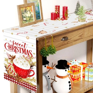 Sweet Christmas table runner with festive tree patterns on a rustic wooden table