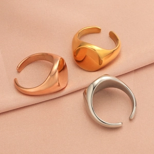 Three-color minimalist stainless steel rings in gold, silver, and rose gold finishes