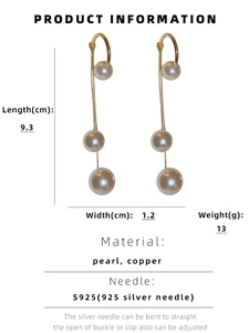 Detail view of long pearl tassel earrings with dimensions 9.3cm and S925 silver needles
