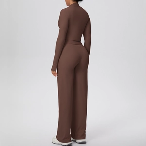 Rear view of brown yoga set showing high-waisted wide-leg pants and crop top texture