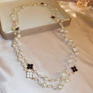 French vintage double-layered long pearl necklace with classic clover charms on satin
