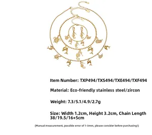 Detailed view of marine themed gold plated stainless steel jewelry set with zircon