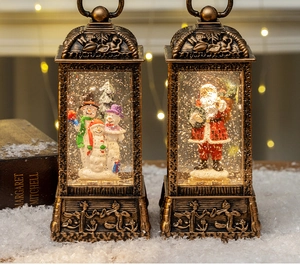 Detail of vintage bronze Christmas lanterns with snowmen, Santa, and warm glow effects