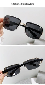 Detail view of Y2K rimless sunglasses with gold frame and dark grey rhinestone lenses