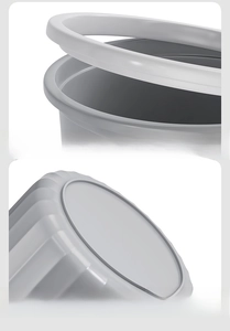 Detail of grey plastic trash bin with fixed pressure ring and anti-slip bottom design