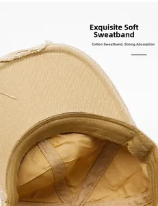 Detail of soft cotton sweatband and distressed brim on the khaki baseball cap
