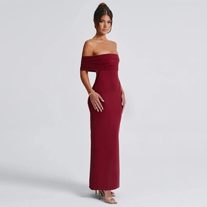 Detail of elegant dark red off-shoulder maxi dress with ruched bodycon fit and sleek fabric