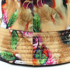 Tie-dye floral bucket hat for summer, showing colorful fabric and stitching details