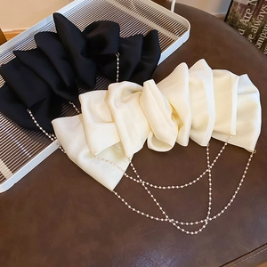 Elegant fabric bow hair clips with faux pearl tassels in black and beige colors