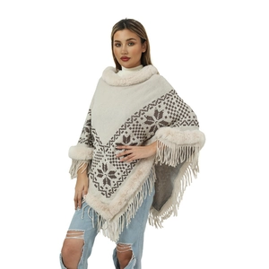 Off-white knitted poncho with faux fur collar, snowflakes patterns and fringe hemline