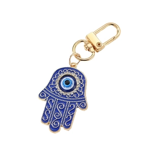 Vintage Hamsa Hand and Evil Eye keychain with blue enamel and sparkling crystals