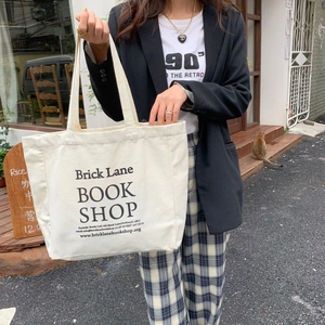Minimalist cream canvas tote bag with Brick Lane Book Shop print for students