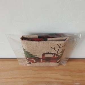 Close-up of Christmas plaid car and tree pattern on durable linen fabric chair cover