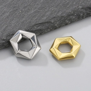 Gold and silver stainless steel hexagonal geometric pendants with a hollow design