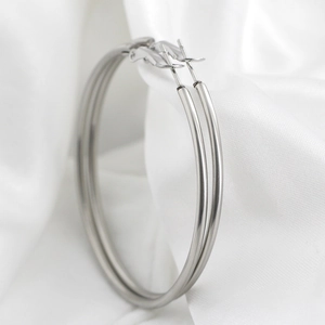 Classic silver 40mm hoop earrings in stainless steel on white silk background