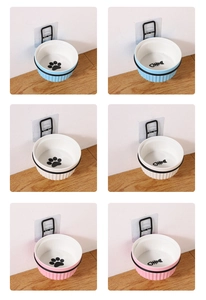 Detail showing wall-mounted ceramic cat bowls with colorful frames and anti-tip brackets