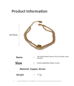 Detail view of 18K gold plated double-layer bracelet showing length and zircon charm details