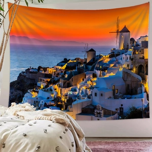 Detailed texture of Santorini sunset tapestry hanging on a bedroom wall as home decor