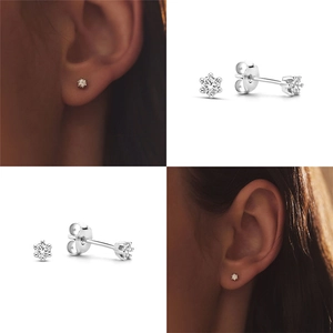 Macro detail of S925 silver square diamond studs with six-prong setting and model shots