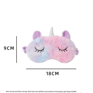 Detail view of the colorful plush unicorn sleep mask with size dimensions 18cm x 9cm