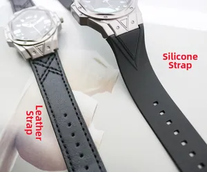 Detail view of men's quartz watches with leather and silicone strap options