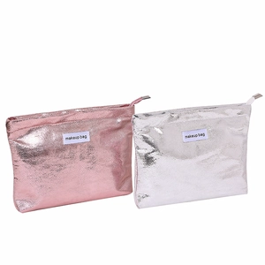 Pink and silver metallic PU leather makeup bags with textured surface and zipper