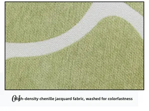 Detail of high-gram chenille jacquard fabric with green wave pattern and soft texture