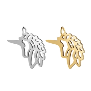 Detail of stainless steel unicorn charm pendants in silver and gold finishes for DIY jewelry