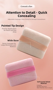 Detail view of square velour powder puffs with finger straps for smooth makeup application