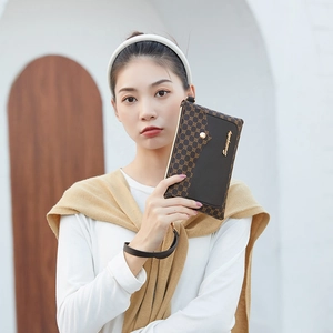 Women's crossbody bag with geometric pattern in brown and black leather mix