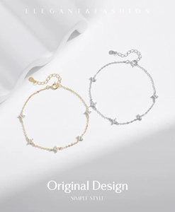 Close-up of S925 sterling silver four-leaf clover bracelets in gold and silver finish