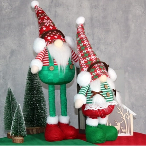 Macro detail of Christmas gnomes with knitted hats and faux fur beards for holiday decor