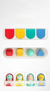 Detail showing four colorful animal pop-up modules and mechanical button operation logic