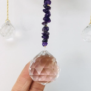 Natural amethyst suncatcher with gold lotus charm and multifaceted crystal ball pendant
