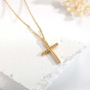 Elegant s925 silver cross pendant necklace with sparkling zircons on a stone base