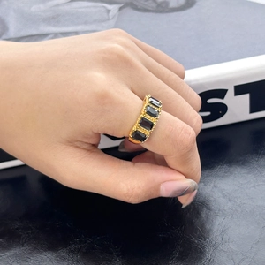 Elegant gold titanium steel ring with five rectangular black zircons in a vintage band
