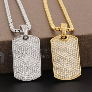 Hip hop style iced out square dog tag pendants in gold and silver plating with rhinestones